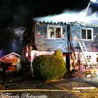 Woman Killed In House Fire That Spread To Neighboring Homes On Long Island