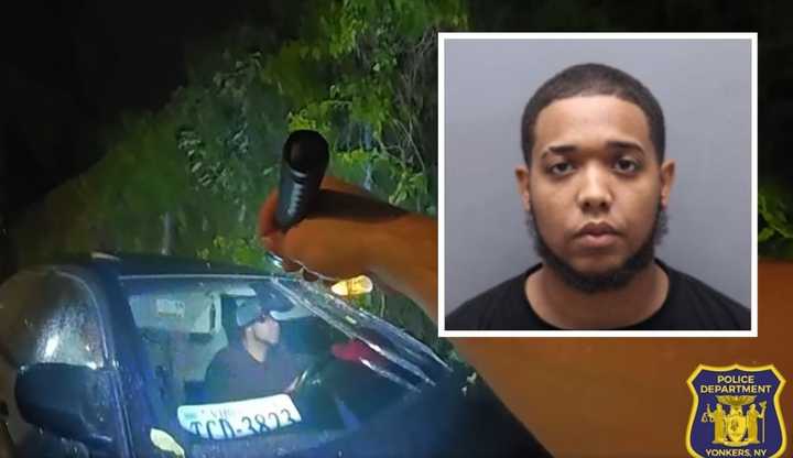 New Rochelle resident Edward Arias, 24, allegedly pinned a Yonkers Police officer's leg between his car and a patrol vehicle while fleeing a traffic stop, police said. 