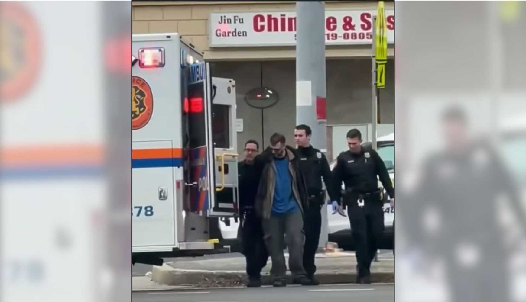 
Nassau County Police escort a suspect into an ambulance following a double stabbing at A & A Italian Deli in Bethpage on Thursday morning, Dec. 4.
  

