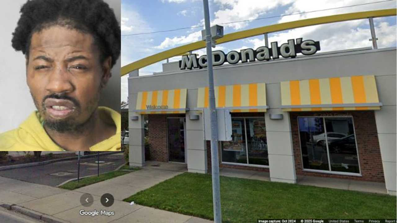 Jonathan Green, 37, is accused of injuring two Nassau County police officers during a disturbance at the Lawrence McDonald’s on Rockaway Turnpike.