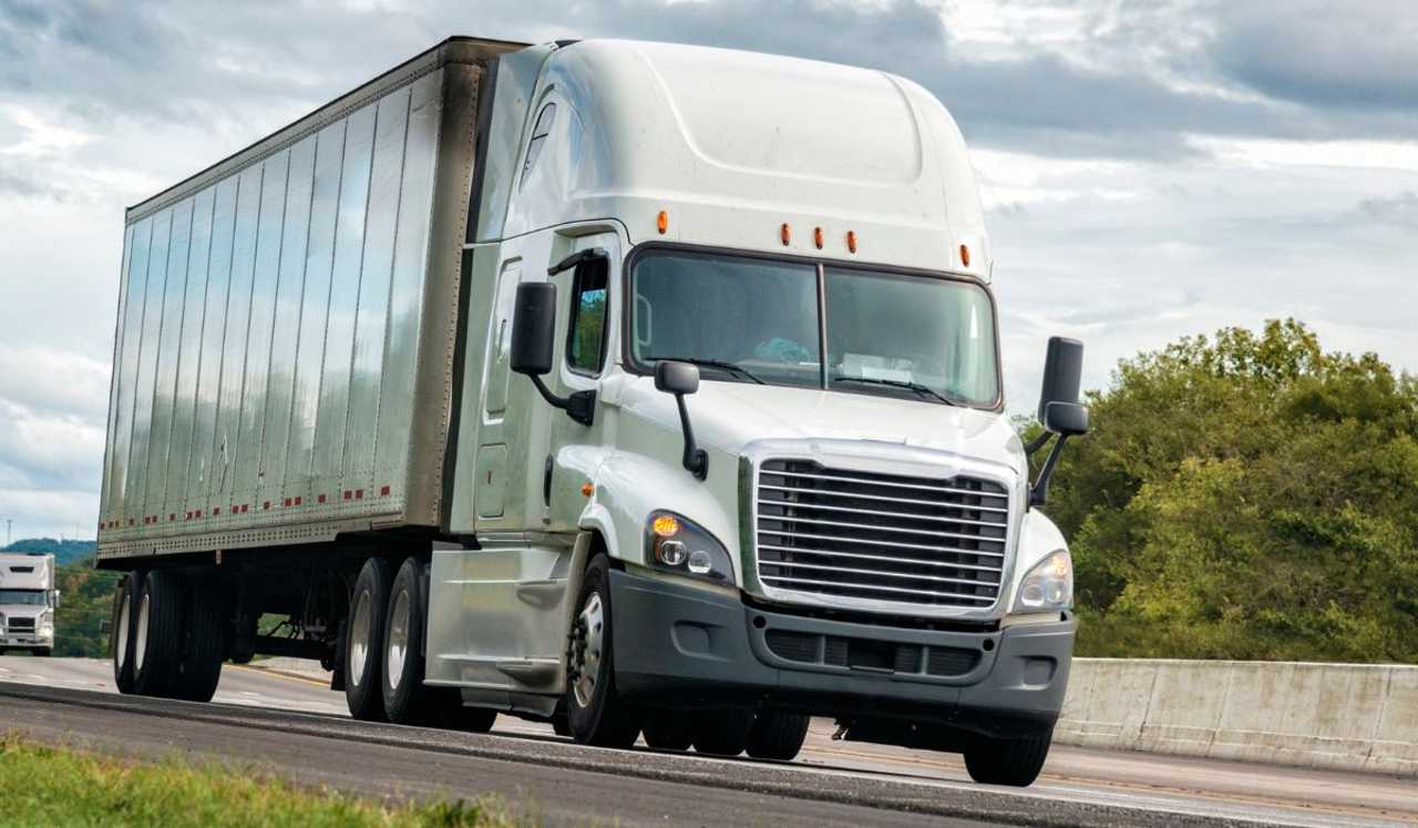 A stock photo of a tractor-trailer. 