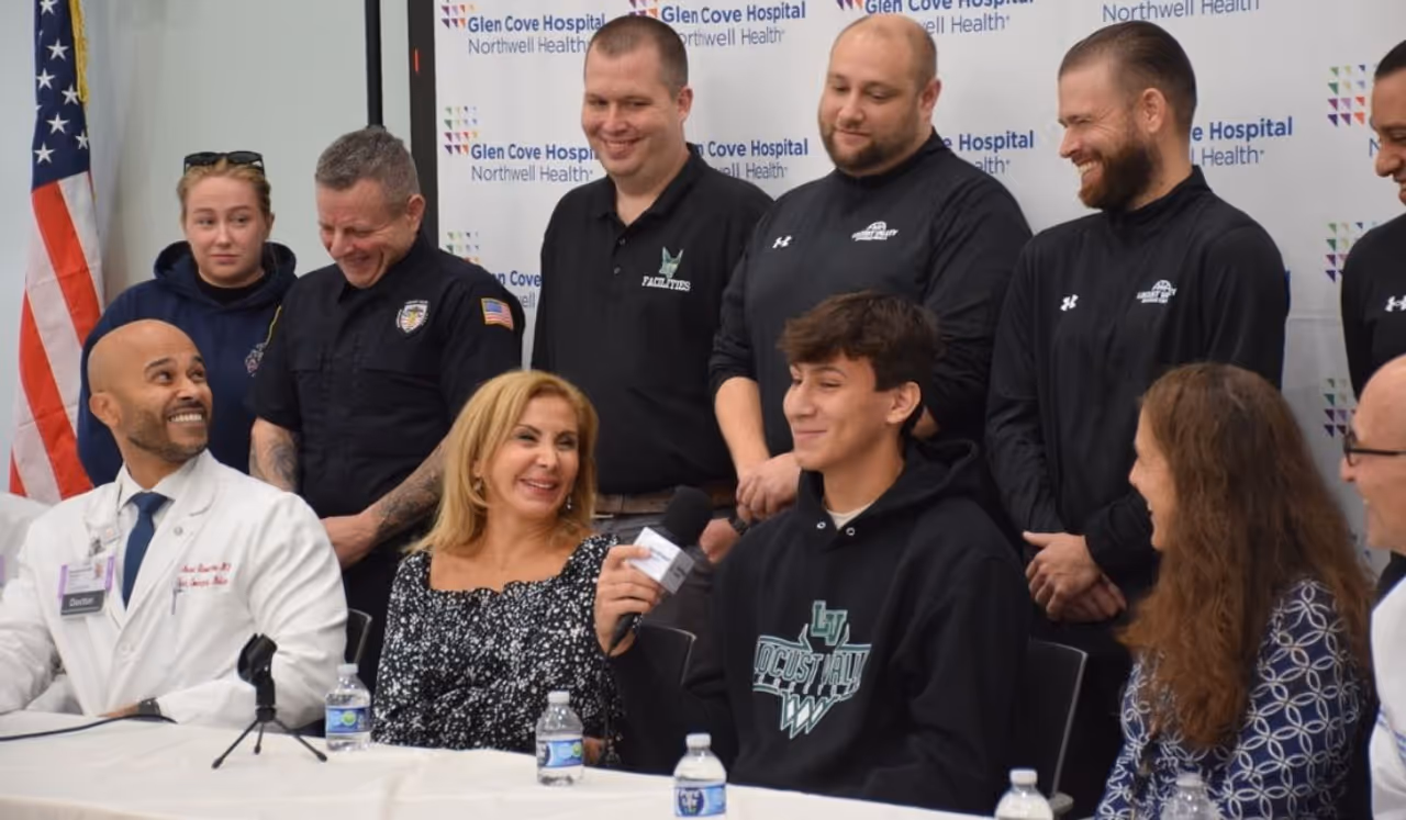 Francesco Allocca, pictured with his mother Pia, staff from Locust Valley High School, and Northwell Health officials.
Francesco Allocca, pictured with his mother Pia, staff from Locust Valley High School, and Northwell Health officials.