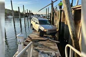 Teen Driver Lands On Dock After Crashing Through Fence At Port Jefferson Marina
