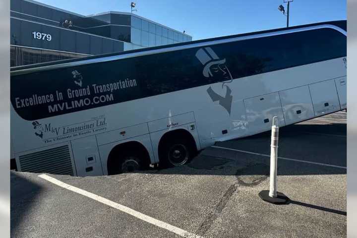 Tour Bus Drops Through Parking Garage Amid Collapse On Long Island (DEVELOPING)