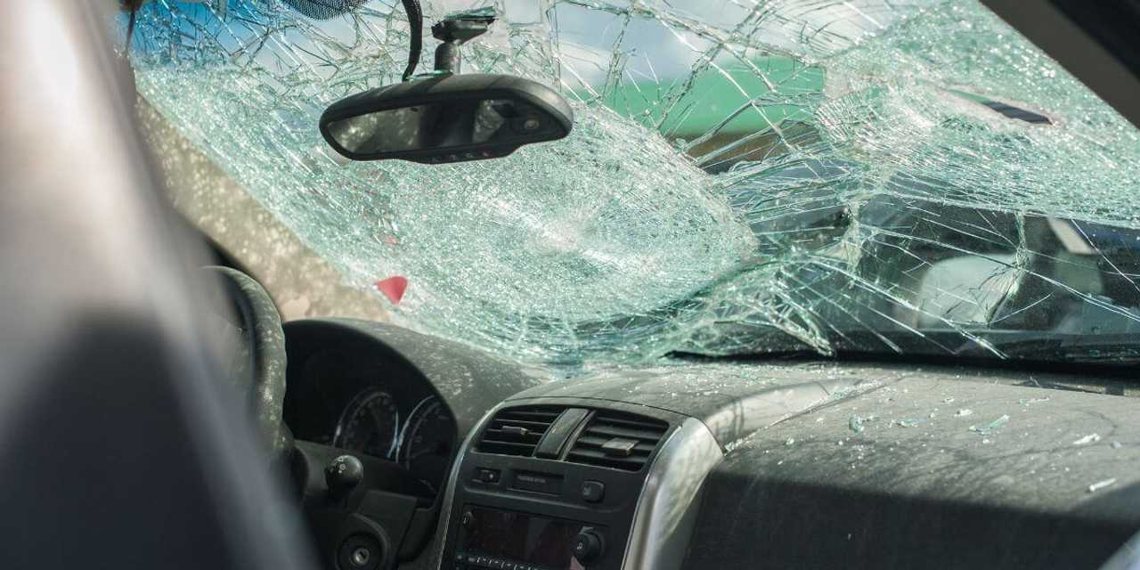 A stock photo of a shattered windshield. A stock photo of a shattered windshield.