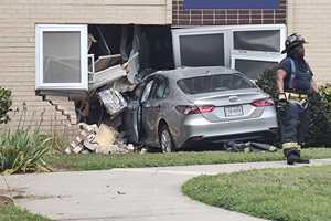 Senior Watching TV When Car Crashes Into Uniondale Apartment (DEVELOPING)