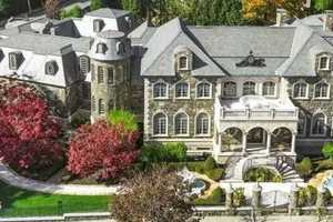 NY Socialite's Former Mansion With Bowling Alley, Koi Pond, Elevator Listed For $25M