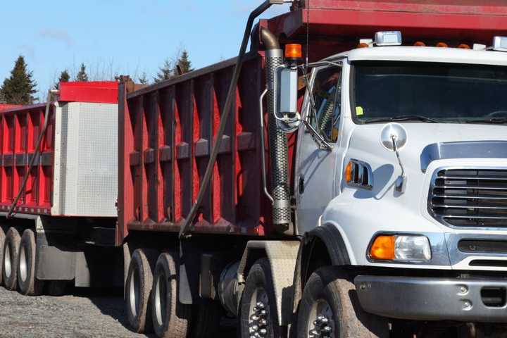 Driver Dead After Tractor-Trailer Slams Into NY House, Knocks It Off Foundation