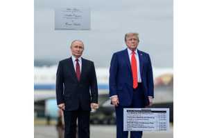 Papers Left In Alaska Hotel Printer Reveal Trump-Putin Summit Secrets