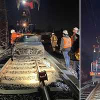 <p>Crews remove an SUV that drove onto the LIRR tracks near the&nbsp;Elmont station on Sunday, Dec. 8.&nbsp;</p>