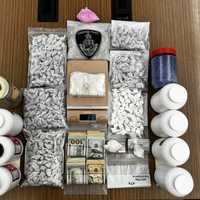 <p>Each white container was full of fentanyl, police said.&nbsp;</p>