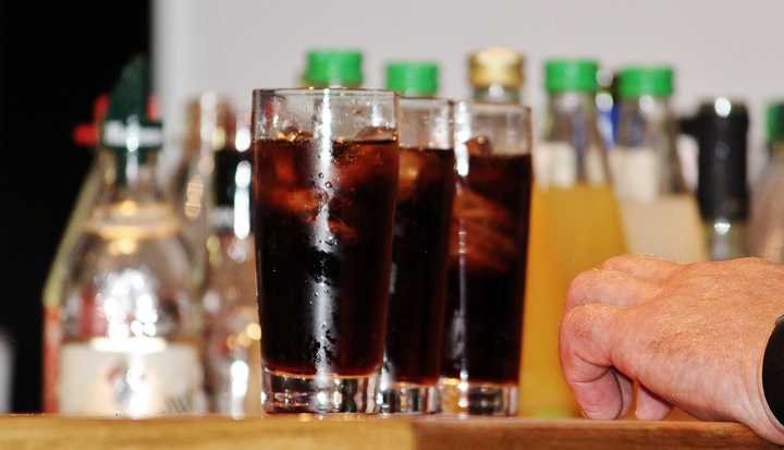 Glasses filled with soda.