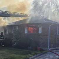 Nassau Resident Returns To Unlivable Home After Fire Rips Through Two Floors: Authorities
