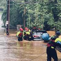 Kids Rescued From Submerged Car During Flash Flood, Officials Say