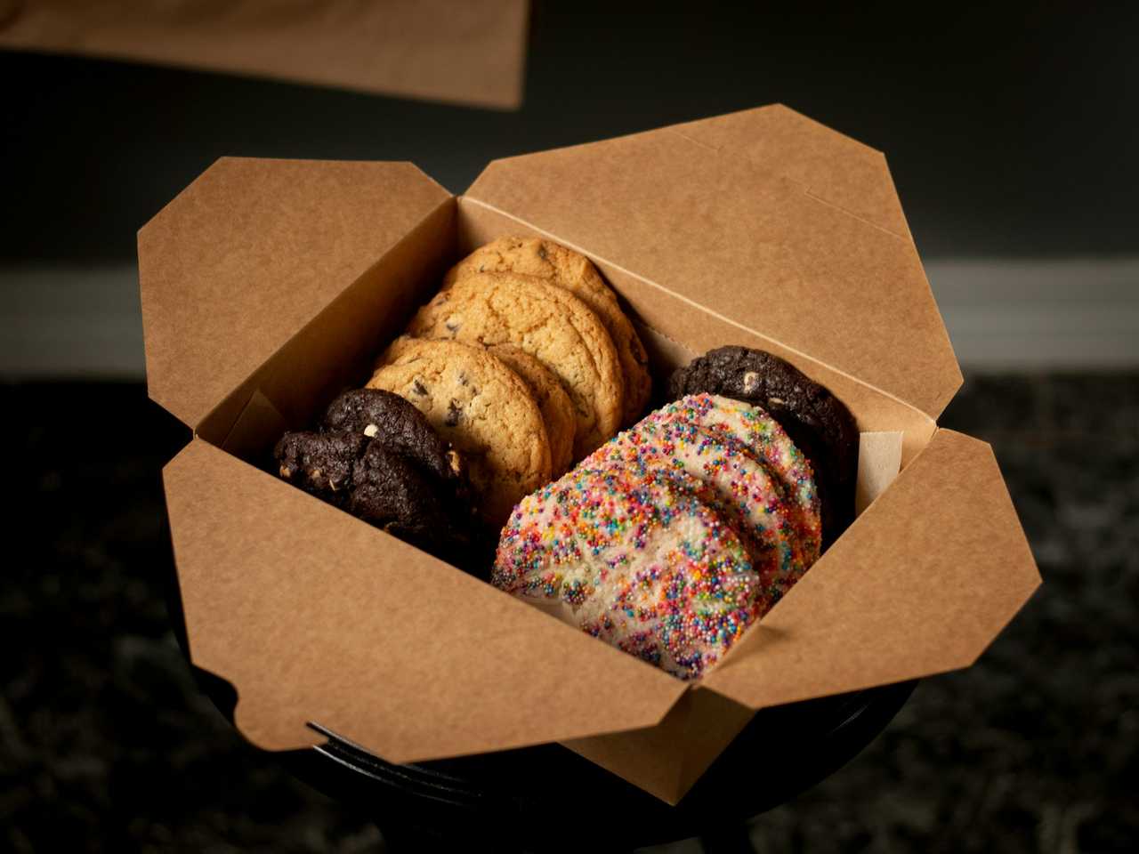 A box filled with various cookies. A box filled with various cookies.