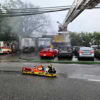 Massive Fire Breaks Out At Fort Lee Auto Shop, Firefighter Injured