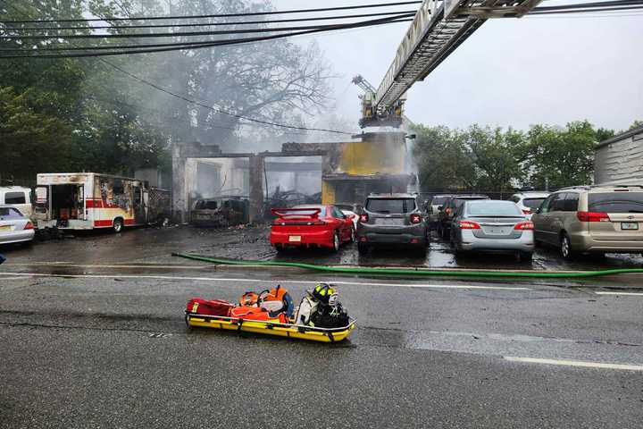 Massive Fire Breaks Out At Fort Lee Auto Shop, Firefighter Injured