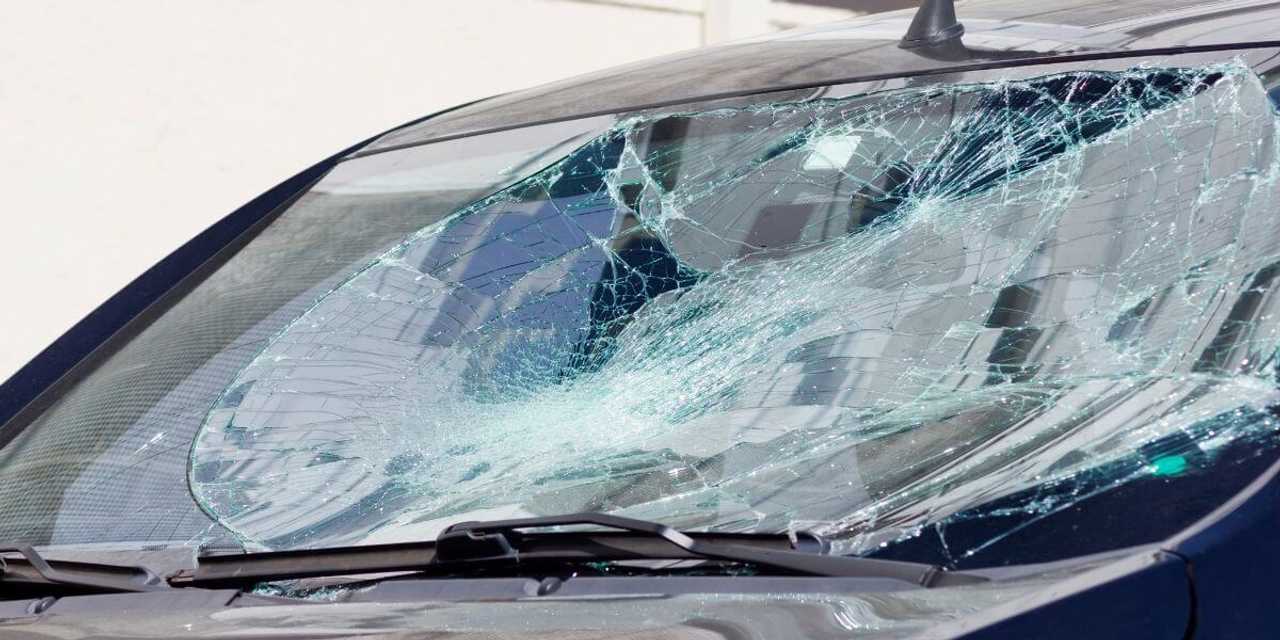 A stock photo of a shattered windshield.
