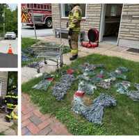 <p>Scenes from the fire at Happy Laundry Day on May 17.</p>