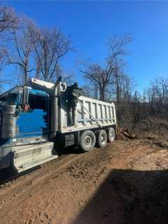 Not-So-Slick Move: Dump Truck Sinks In Mud After Unloading Illegal Debris In Hudson Valley