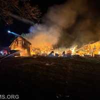 <p>The scene of the two-alarm farm and house fire.&nbsp;</p>