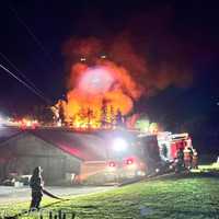 <p>The scene of the two-alarm farm and house fire.&nbsp;</p>