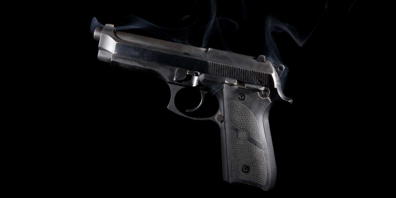 A handgun. A handgun.