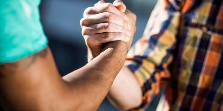 Men shaking hands.