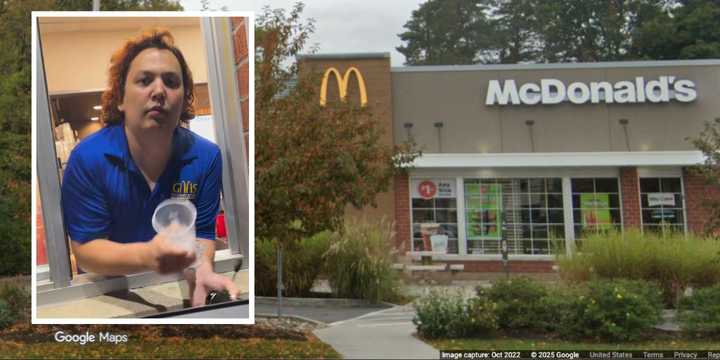 An employee is seen leaning out of the drive-thru window before throwing a cup into a customer's car at the McDonald’s on Route 50 in Glenville early Monday, Sept. 29.
