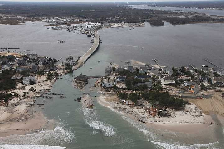 Storm surge and flooding from Hurricane Sandy created a temporary inlet in Mantoloking, NJ.