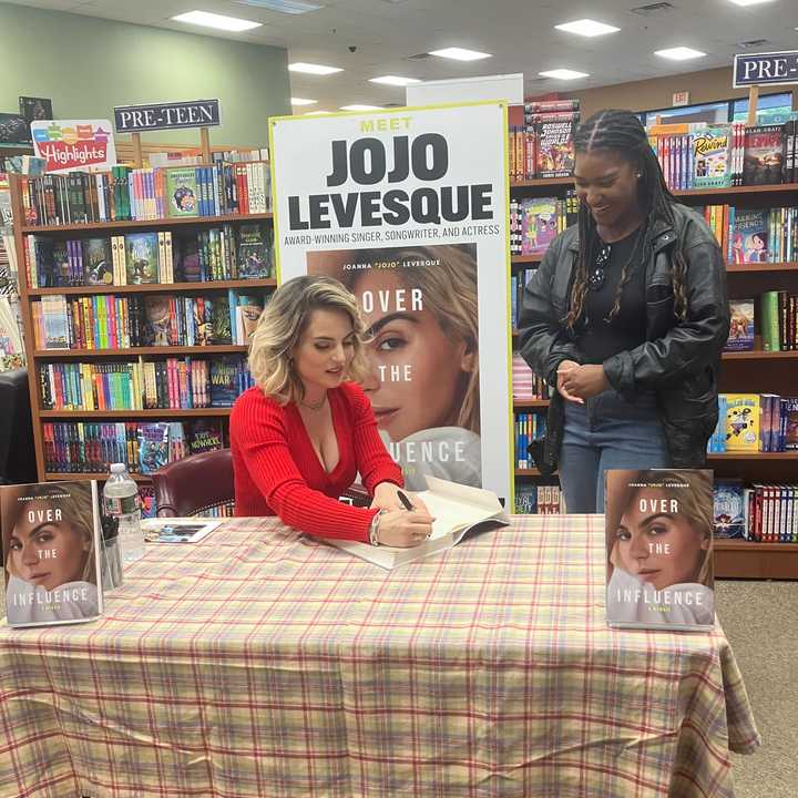 Jojo signing books at Books and Greetings.