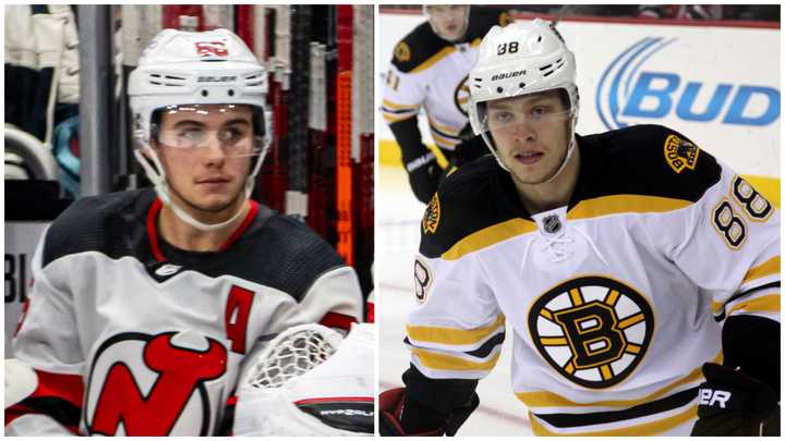 New Jersey Devils center Jack Hughes and Boston Bruins right wing David Pastrnak. Internationally, Hughes represents the US and Pastrnak plays for Czechia.