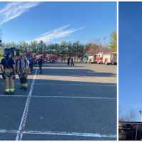 <p>Firefighters staging outside the scene of a wildfire near Lakewood Country Club in Lakewood, NJ.</p>