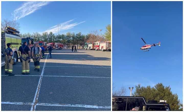 Firefighters staging outside the scene of a wildfire near Lakewood Country Club in Lakewood, NJ.