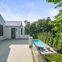 <p>324 Hardenburg Avenue in Demarest - deck overlooking the pool from the primary suite.</p>