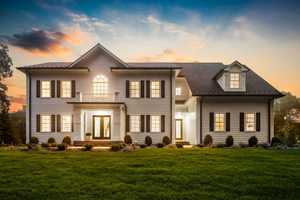 $2.795M Ramsey Mansion With Theater, Chef’s Kitchen, Wine Wall Hits Market