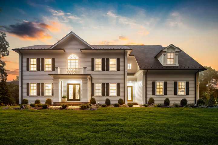 $2.795M Ramsey Mansion With Theater, Chef’s Kitchen, Wine Wall Hits Market