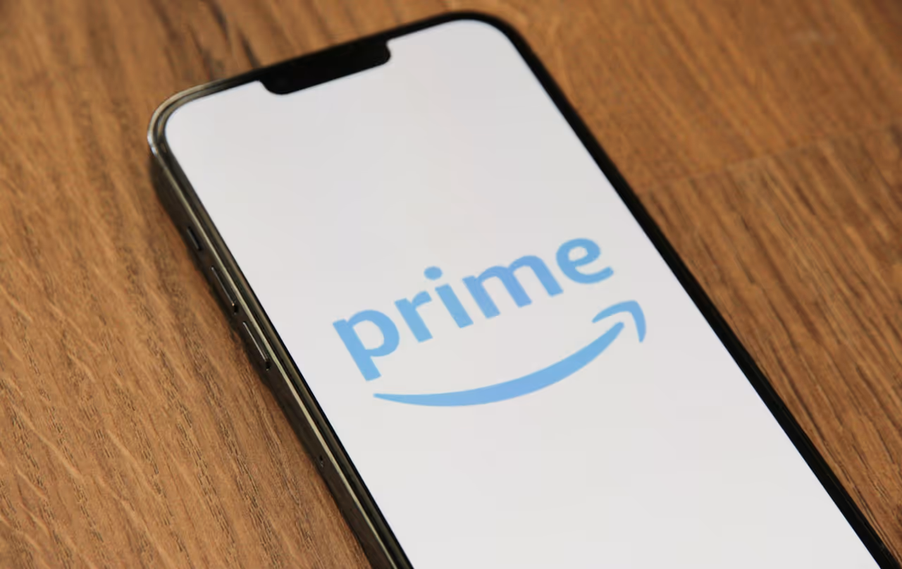 A smartphone displaying the Amazon Prime logo.