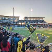 <p>USL Championship team New Mexico United supporters celebrate a goal on April 15, 2023.</p>