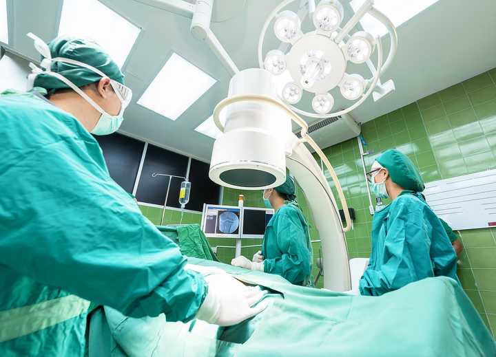 Doctors in a hospital operating room.