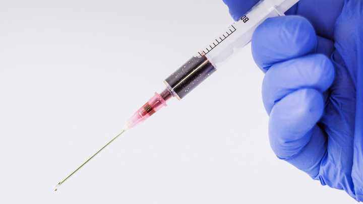 A file photo of a syringe with needle. 