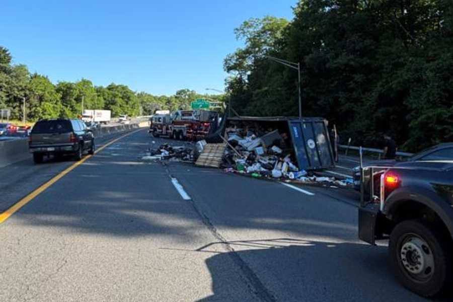 City Truck Carrying Waste Overturns On Thruway In Yonkers, Spills Trash