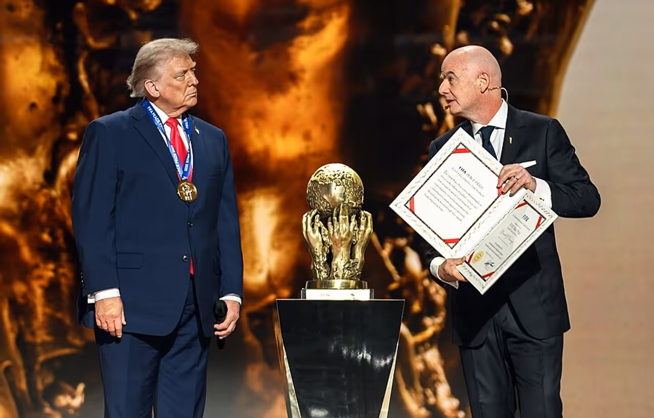 FIFA president Gianni Infantino gives the inaugural FIFA Peace Prize to US President Donald Trump at the 2026 FIFA World Cup Draw in Washington, DC, on December 5, 2025. FIFA president Gianni Infantino gives the inaugural FIFA Peace Prize to US President Donald Trump at the 2026 FIFA World Cup Draw in Washington, DC, on December 5, 2025.