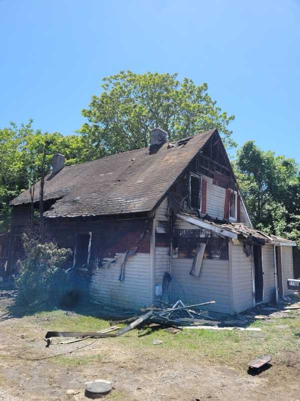 Heroic Neighbor Uses Ladder To Rescue Maryland Man Trapped On Roof In House Fire