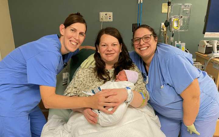 Cash Levi Burkholder, the first WellSpan New Year's baby, with his mom, Amber Burkholder, and Lindsay Thomas (left) certified nurse midwife, and Margie Shew, registered nurse.