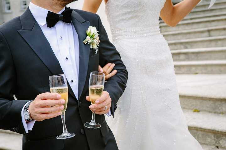 The marriage of Elvis Harizaj and Natasha Flores was all a sham, authorities said.